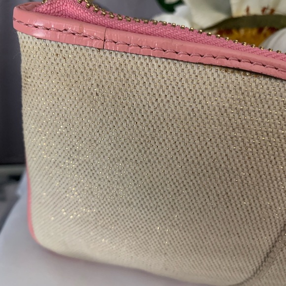 🔥SOLD🔥 Limited Edition Coach Floral Canvas Wristlet Leather Trim and Bow
Charm - Picture 5 of 9